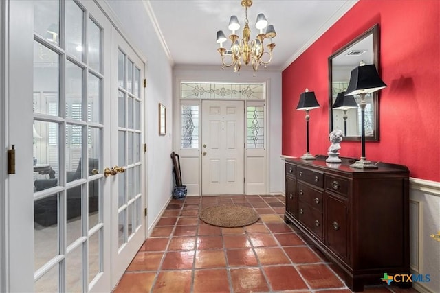 13650 Blackberry Rd, Salado, TX 76571 - foyer entrance featuring french doors, crown molding, and a chandelier