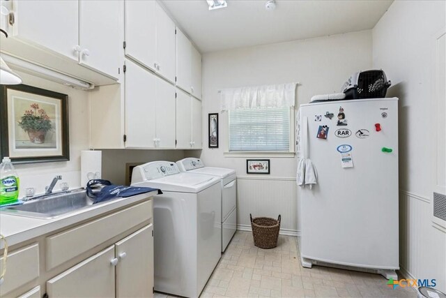 13650 Blackberry Rd, Salado, TX 76571 - laundry area featuring cabinet space and washer and dryer