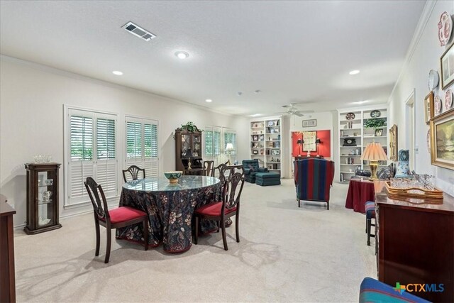 13650 Blackberry Rd, Salado, TX 76571 - dining area featuring crown molding, carpet flooring, ceiling fan, recessed lighting, and built in features