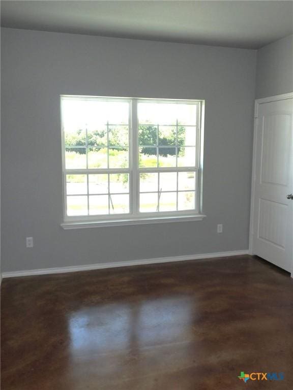 1421 Lindsey Dr, Copperas Cove, TX 76522 - unfurnished room featuring healthy amount of natural light and baseboards