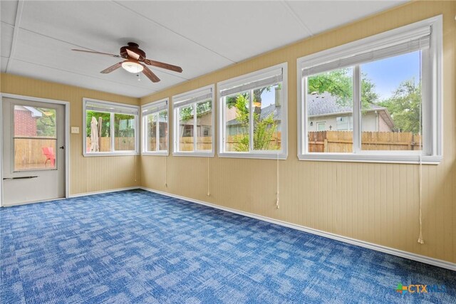 unfurnished sunroom featuring plenty of natural light