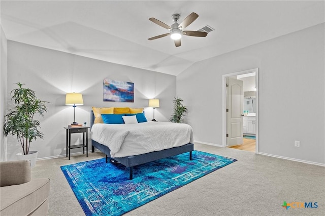 bedroom featuring vaulted ceiling, carpet floors, and baseboards