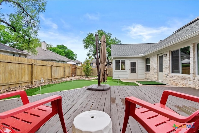 deck featuring a fenced backyard