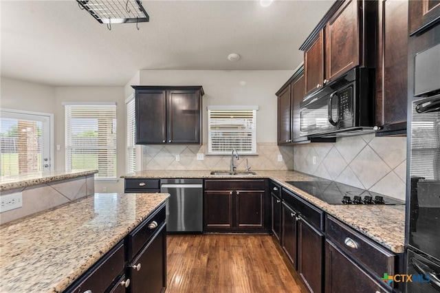 3303 Lorne Dr, Killeen, TX 76542 - kitchen featuring black appliances, a sink, dark wood-style floors, light stone counters, and dark brown cabinetry