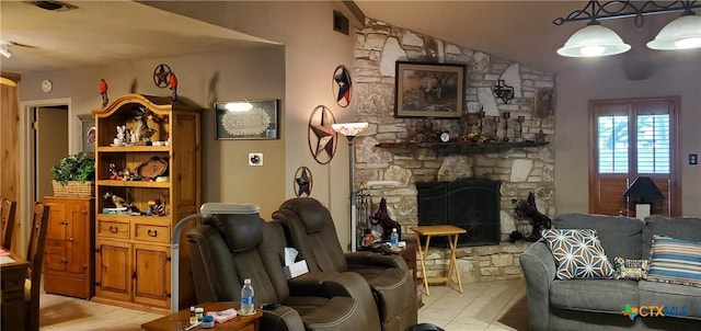 130 Twin Oak Rd, Seguin, TX 78155 - living room with light tile patterned floors, a stone fireplace, and vaulted ceiling