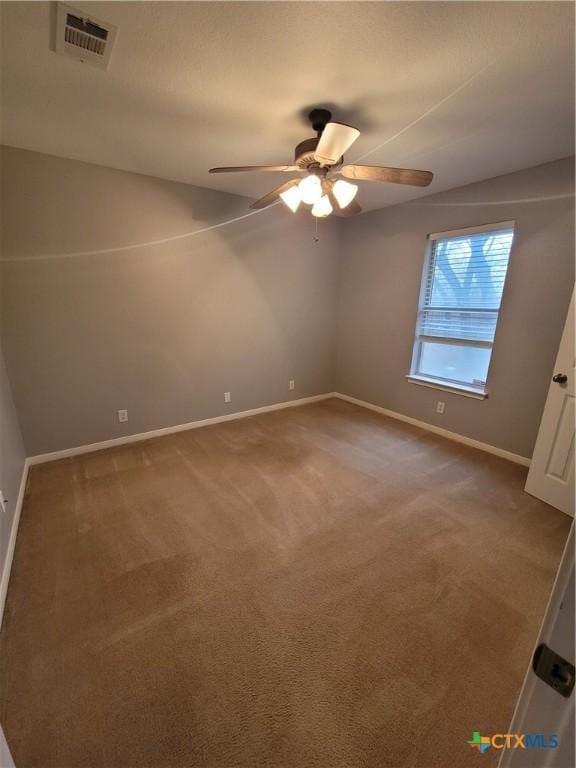 3803 Canyon Heights Rd, Belton, TX 76513 - unfurnished bedroom featuring carpet flooring, a ceiling fan, baseboards, and visible vents