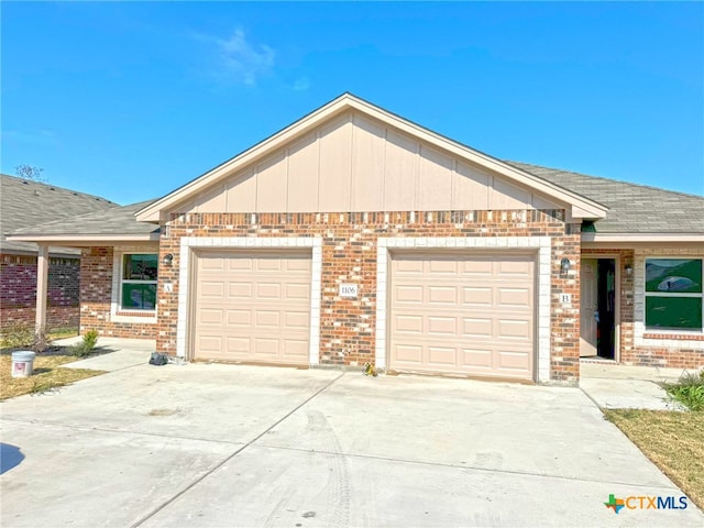 view of front of home featuring a garage