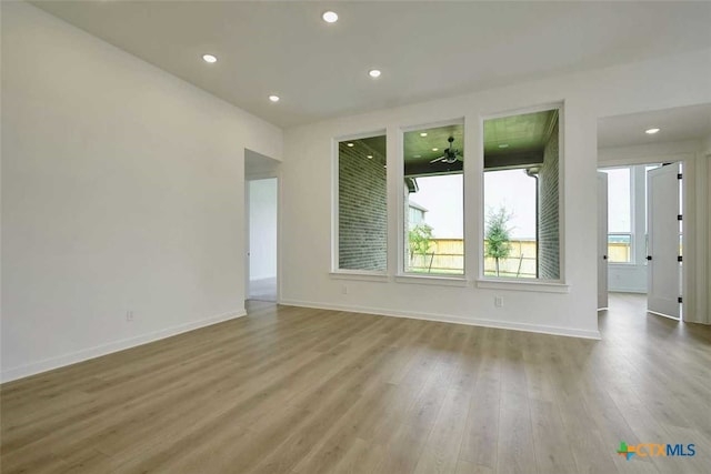 unfurnished room featuring light wood-type flooring