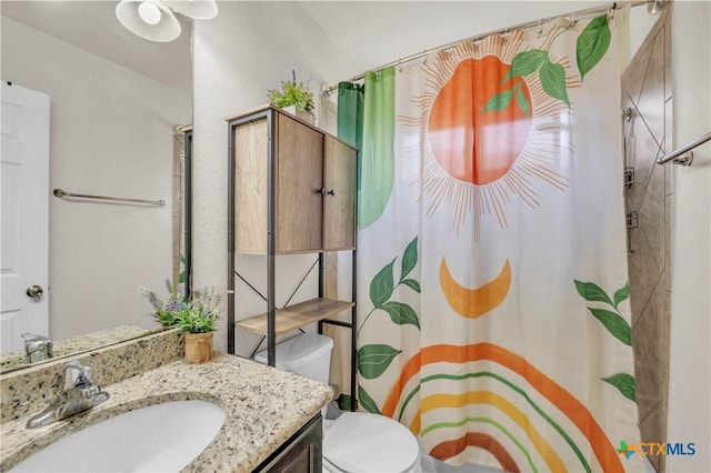 709 Rowdy Dr, Killeen, TX 76542 - full bathroom with vanity, toilet, and curtained shower