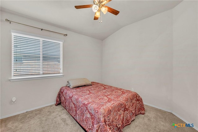 709 Rowdy Dr, Killeen, TX 76542 - carpeted bedroom with vaulted ceiling, baseboards, and ceiling fan