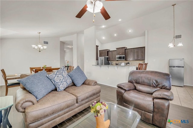 709 Rowdy Dr, Killeen, TX 76542 - living area with vaulted ceiling, a chandelier, ceiling fan, light wood finished floors, and recessed lighting