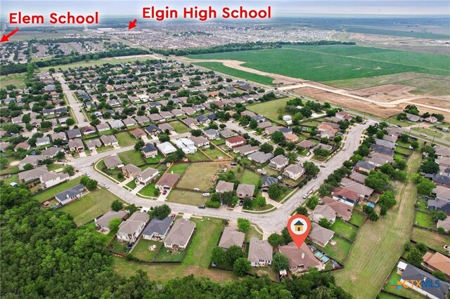 211 Gettysburg Loop, Elgin, TX 78621 - drone / aerial view with a residential view