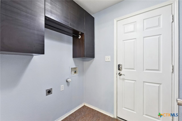 211 Gettysburg Loop, Elgin, TX 78621 - washroom featuring cabinet space, washer hookup, baseboards, and hookup for an electric dryer