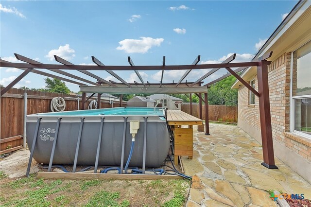 211 Gettysburg Loop, Elgin, TX 78621 - view of pool featuring a pergola, a fenced in pool, and a fenced backyard
