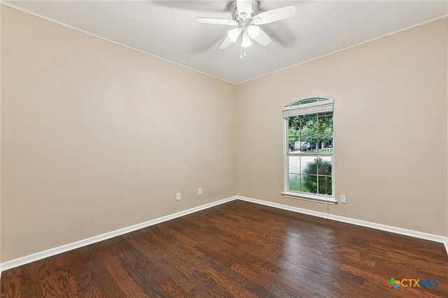 211 Gettysburg Loop, Elgin, TX 78621 - empty room featuring baseboards, dark wood-style flooring, ornamental molding, and ceiling fan