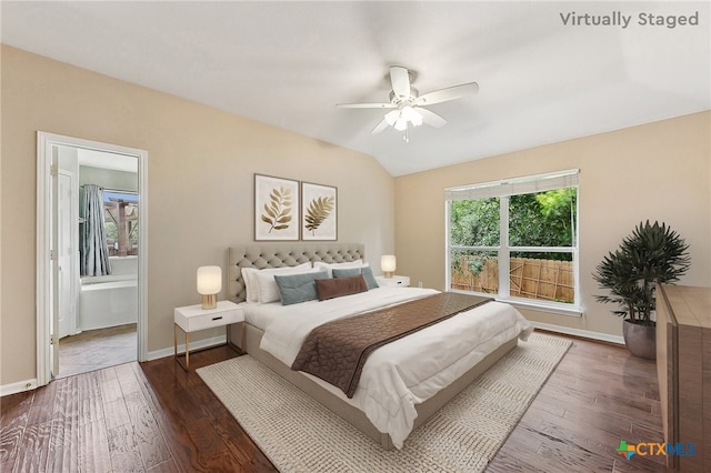 211 Gettysburg Loop, Elgin, TX 78621 - bedroom featuring lofted ceiling, a ceiling fan, baseboards, ensuite bathroom, and wood finished floors