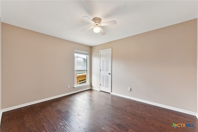 211 Gettysburg Loop, Elgin, TX 78621 - unfurnished room with dark wood-type flooring, baseboards, and a ceiling fan