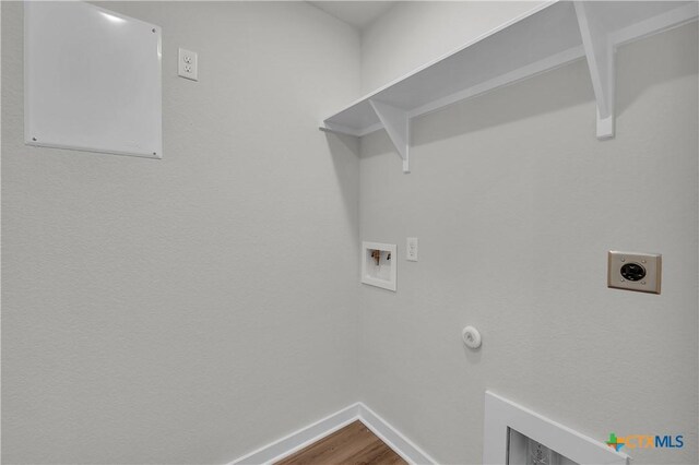 unfurnished bedroom featuring a textured ceiling, light carpet, ceiling fan, and ensuite bathroom