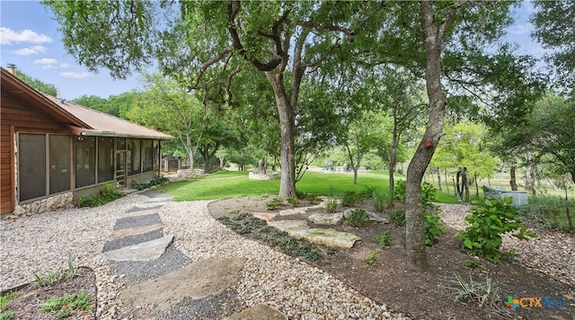 119 Stageline Dr, Kyle, TX 78640 - view of green lawn with a sunroom