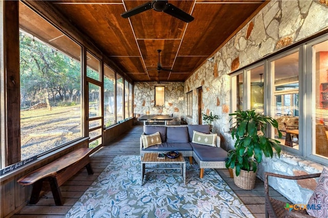 119 Stageline Dr, Kyle, TX 78640 - sunroom featuring wooden ceiling, a ceiling fan, wood-type flooring, and an outdoor living space