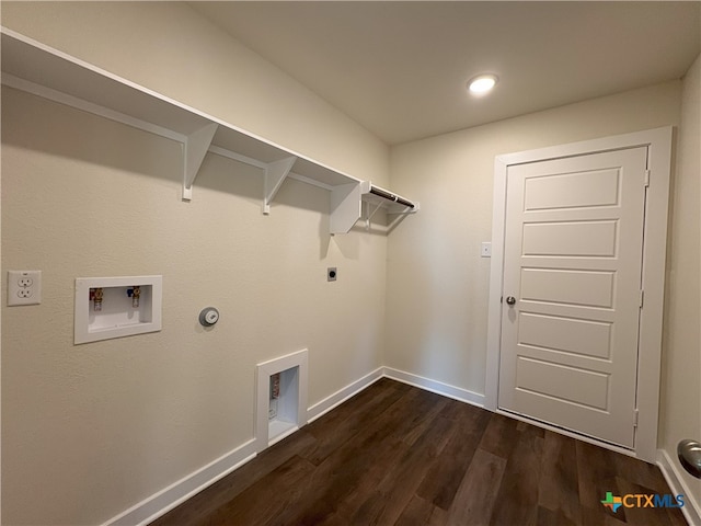 washroom with hookup for an electric dryer, dark hardwood / wood-style floors, hookup for a gas dryer, and hookup for a washing machine