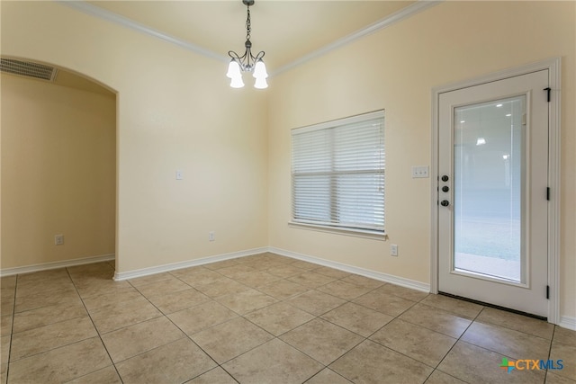 interior space featuring light tile patterned flooring, a chandelier, and ornamental molding