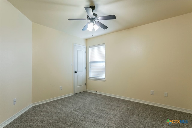 carpeted empty room with ceiling fan