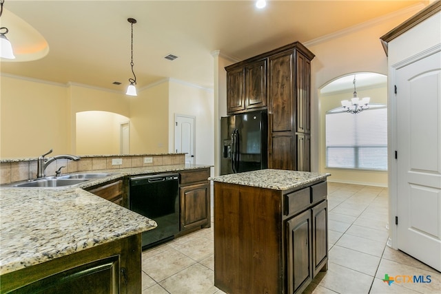 kitchen with a center island, hanging light fixtures, black appliances, sink, and ornamental molding