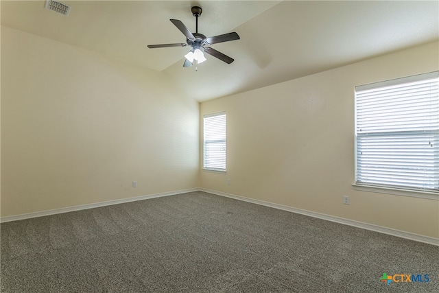 unfurnished room featuring ceiling fan, lofted ceiling, and carpet