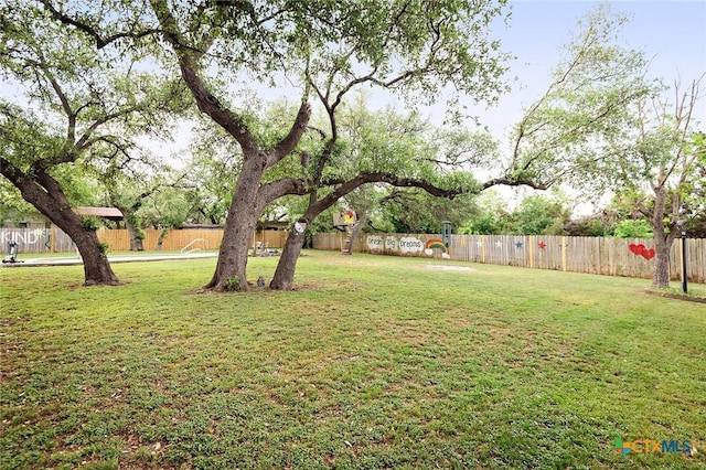view of yard featuring a fenced backyard