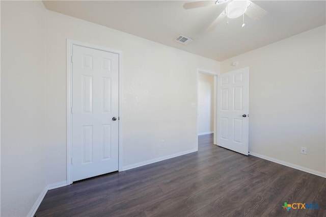 3907 Llano Estacado Ct, Killeen, TX 76549 - spare room with dark wood-style floors and a ceiling fan