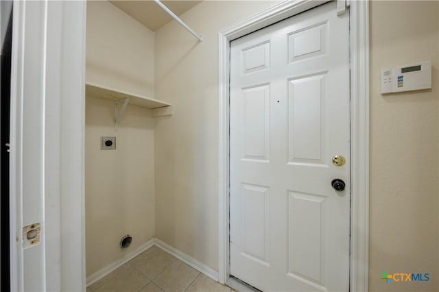 3907 Llano Estacado Ct, Killeen, TX 76549 - laundry room with electric dryer hookup and light tile patterned flooring