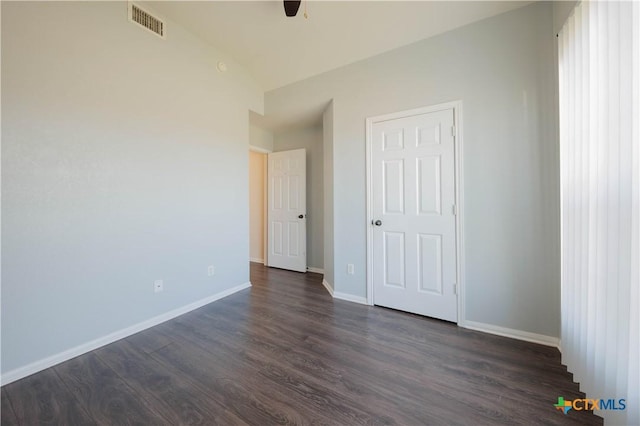 3907 Llano Estacado Ct, Killeen, TX 76549 - unfurnished bedroom with dark wood-style flooring and a ceiling fan