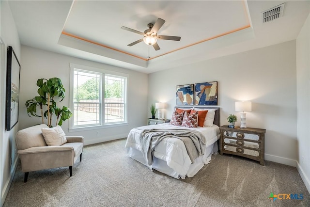 166 Lost Maples Way, Marion, TX 78124 - bedroom featuring a tray ceiling, carpet floors, baseboards, and ceiling fan