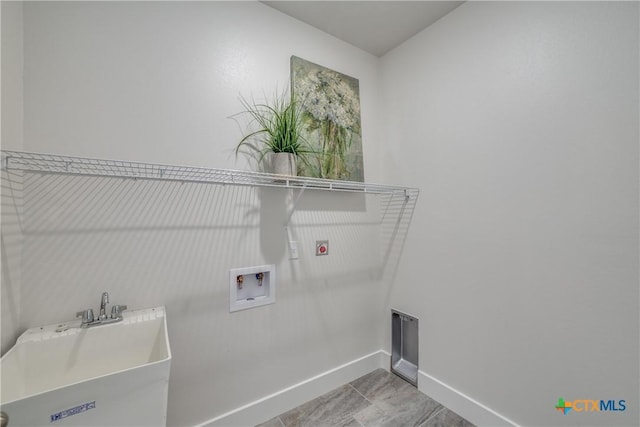 166 Lost Maples Way, Marion, TX 78124 - washroom with washer hookup, electric dryer hookup, and baseboards