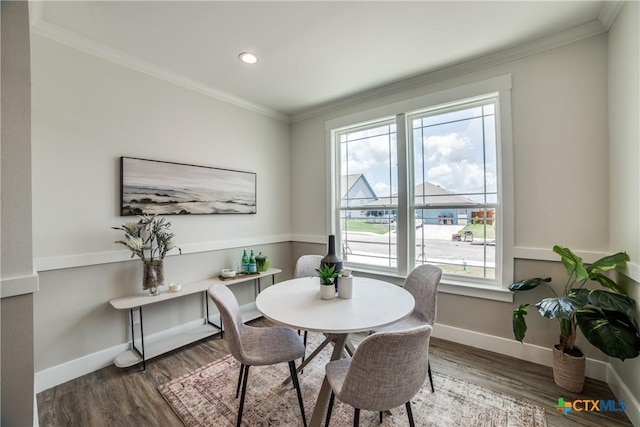 166 Lost Maples Way, Marion, TX 78124 - dining space featuring ornamental molding, wood finished floors, baseboards, and recessed lighting