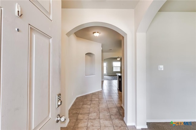 5402 Waterbank Ln, Killeen, TX 76543 - hall with arched walkways and baseboards