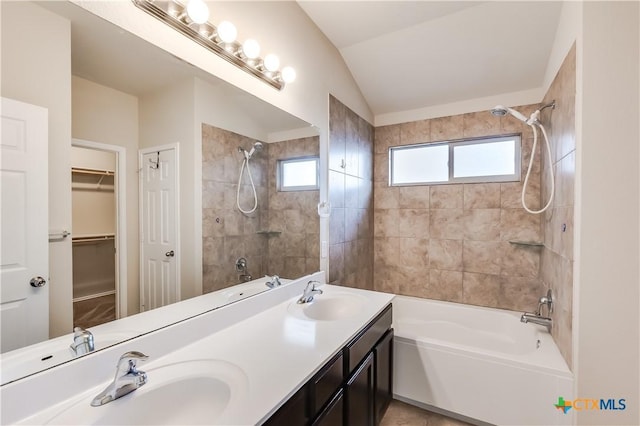 5402 Waterbank Ln, Killeen, TX 76543 - full bath featuring shower / washtub combination, vaulted ceiling, double vanity, and a walk in closet