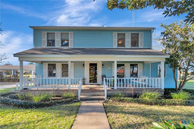 view of front of home featuring covered porch