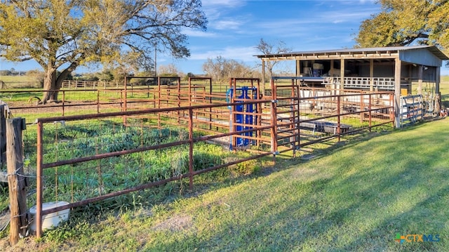 view of outbuilding featuring an outdoor structure, a rural view, and an exterior structure