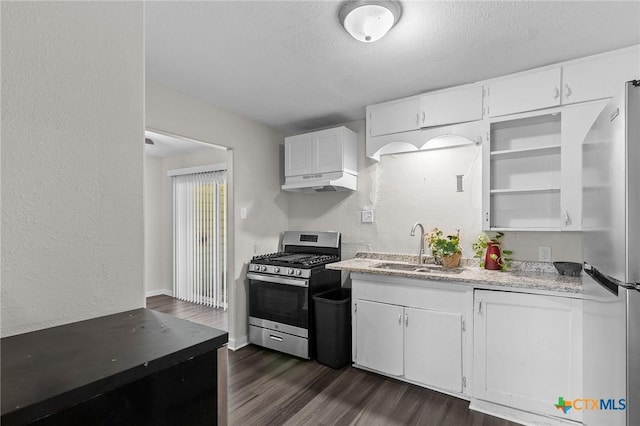 kitchen with open shelves, dark wood-style flooring, white cabinetry, a sink, and appliances with stainless steel finishes