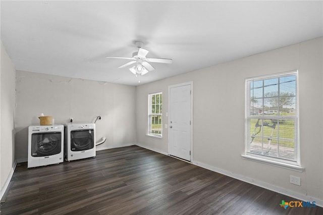 laundry room featuring laundry area, a ceiling fan, independent washer and dryer, and dark wood-type flooring