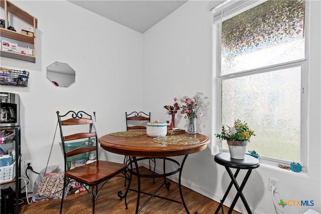dining room with wood finished floors