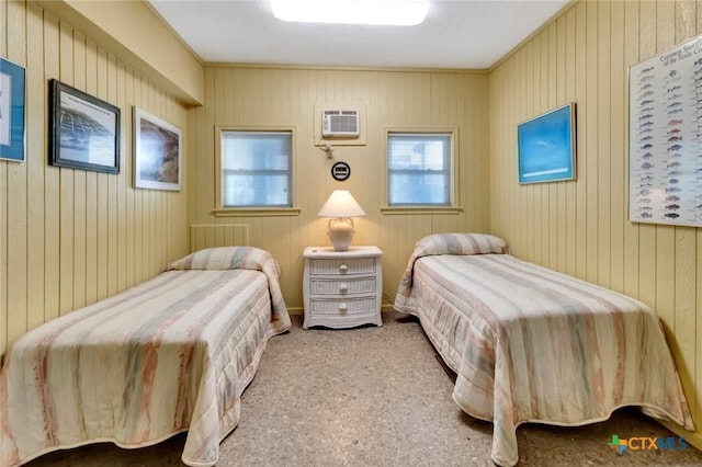 carpeted bedroom featuring a wall mounted air conditioner