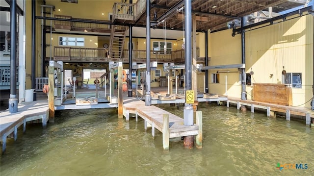 view of dock with a water view