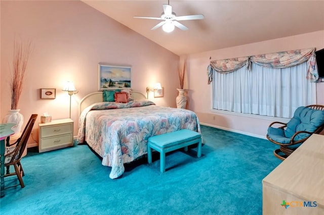 bedroom featuring carpet flooring, vaulted ceiling, baseboards, and ceiling fan