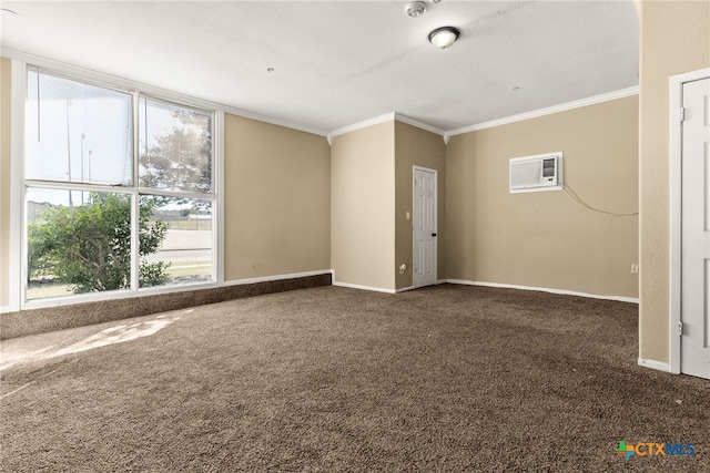 empty room with carpet, ornamental molding, baseboards, and a wall mounted air conditioner