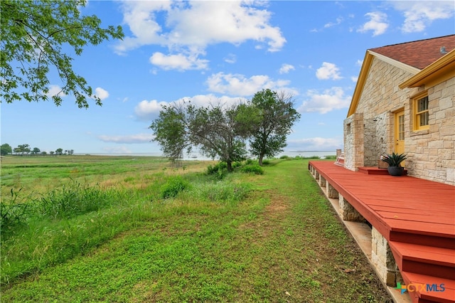 601 Lakewood Dr, Burnet, TX 78611 - view of yard featuring a rural view and a deck