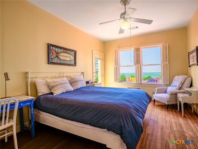 601 Lakewood Dr, Burnet, TX 78611 - bedroom with visible vents, ceiling fan, and wood finished floors