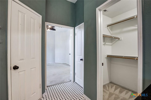 bathroom with ceiling fan